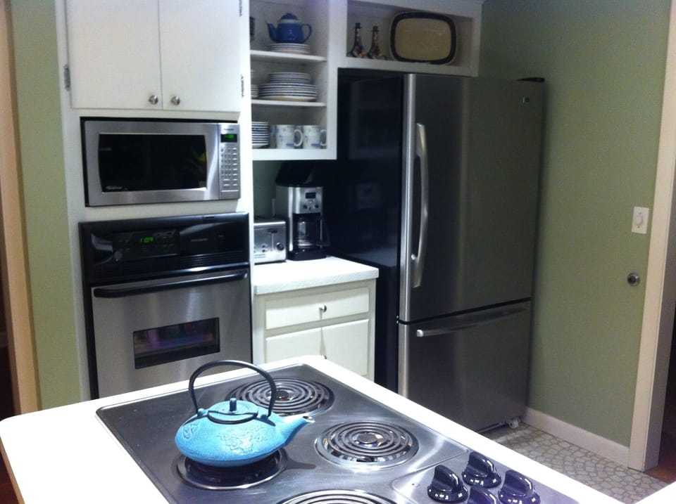 Kitchen with all stainless steel appliances.