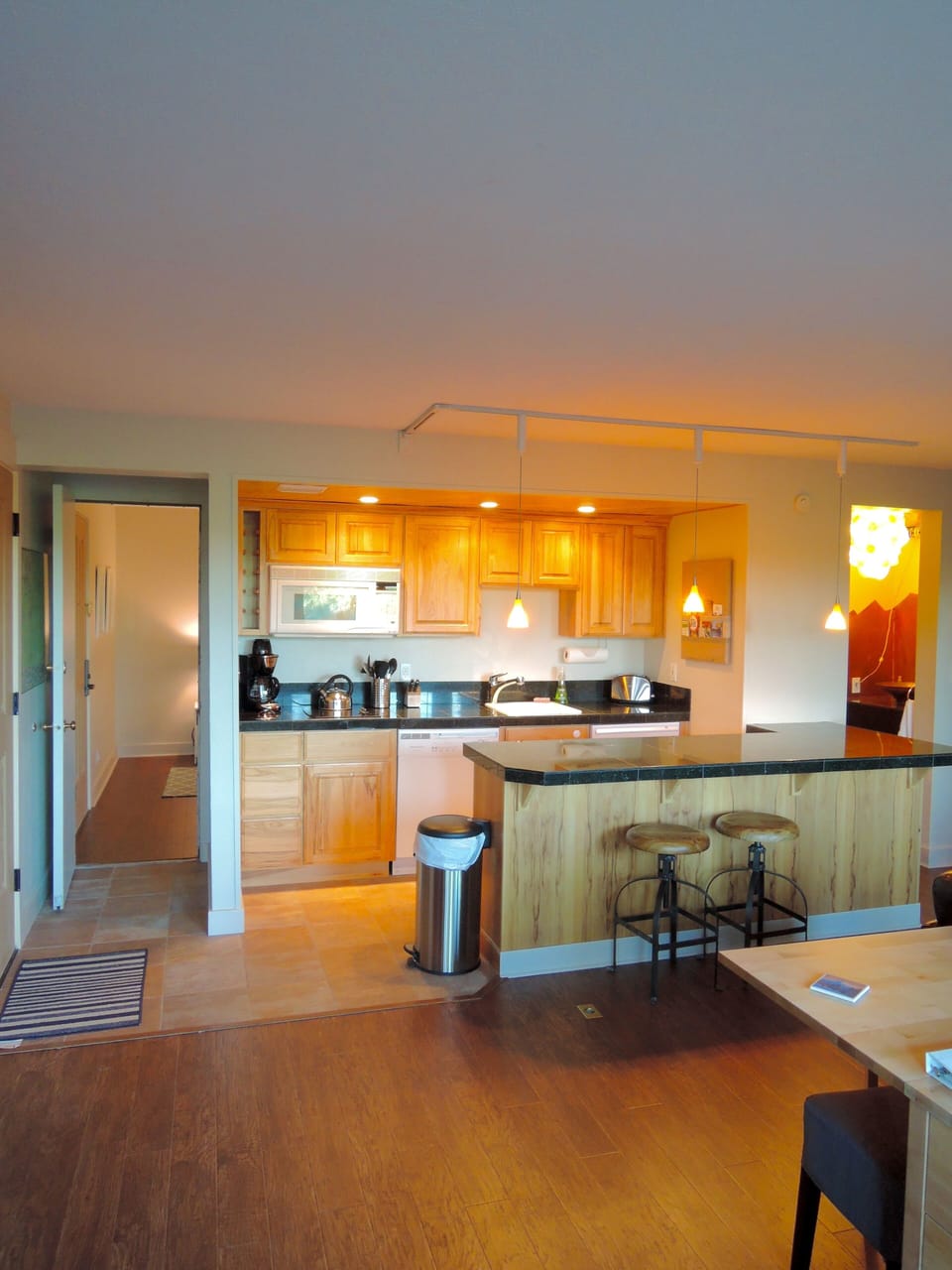 Kitchen and entrance to bedroom