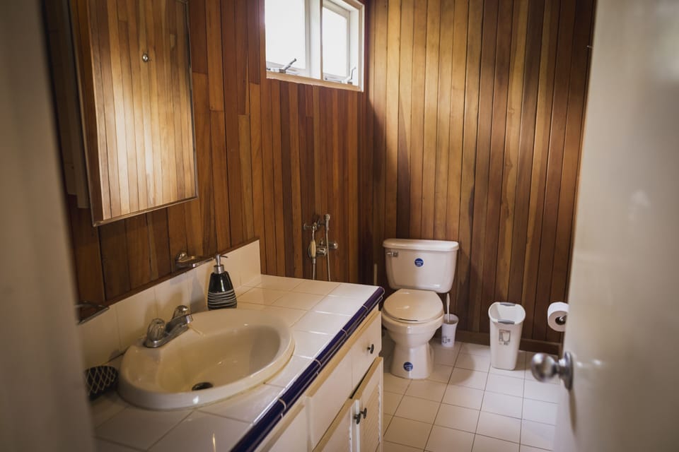 Upstairs washroom with shower to the right