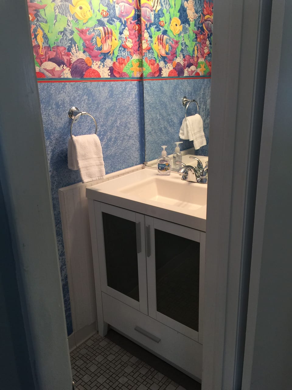 Half bath on first floor; updated vanity and toilet 