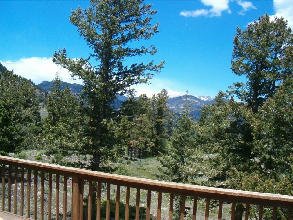 The view toward Rocky Mountain National Park. All living areas and bedrooms share this view and every window in the house has a view.