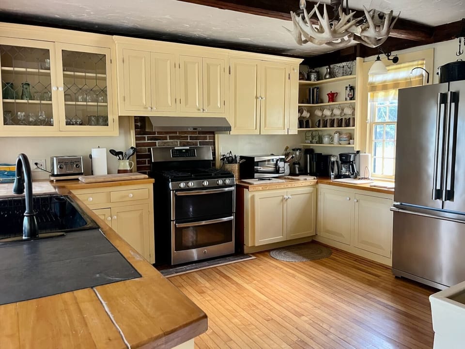 Farmhouse kitchen has plenty of room for multiple cooks. 
