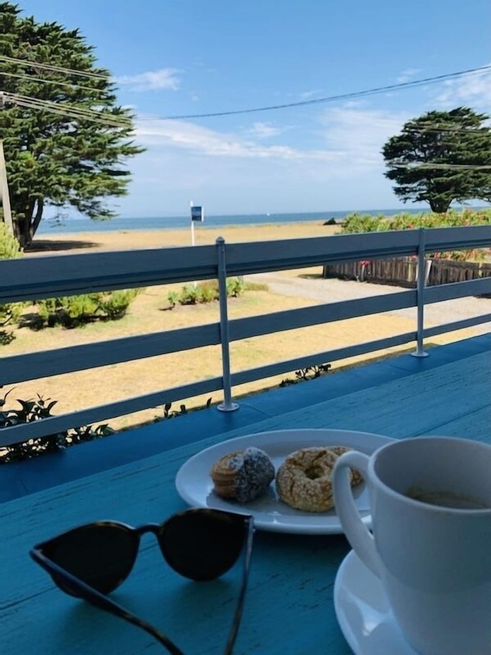 Enjoying a cuppa on the balcony.
Photo courtesy of our guest DD
