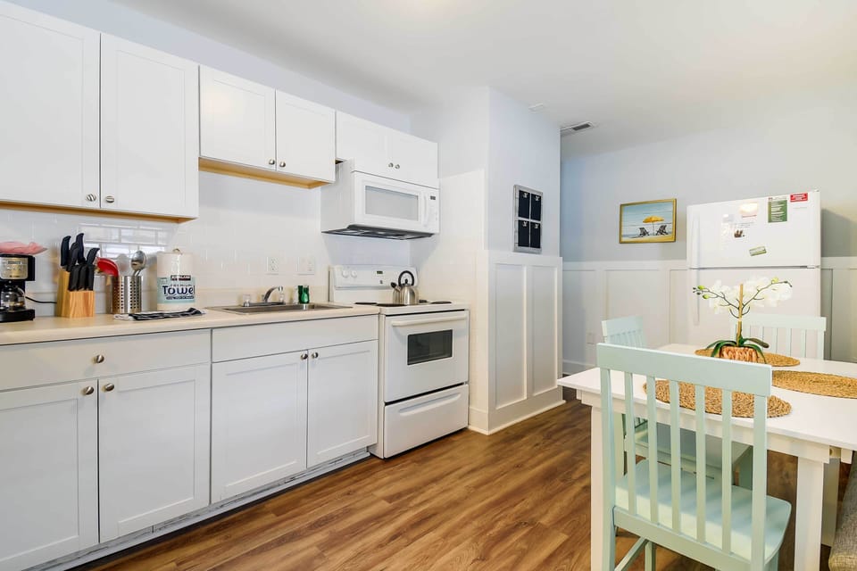 Fridge, microwave, stovetop, coffee/tea maker