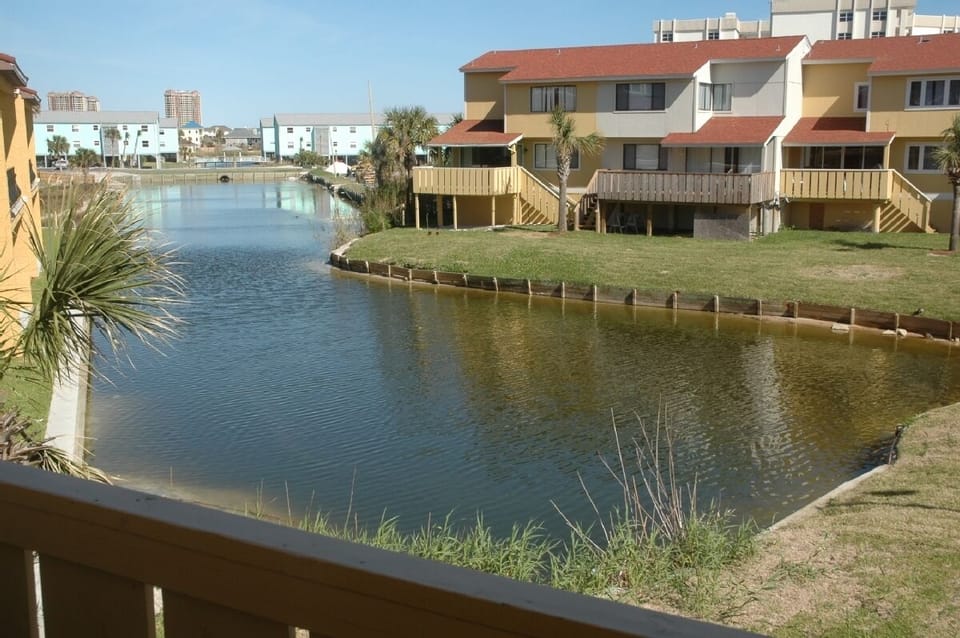 The balconies overlook a small lake