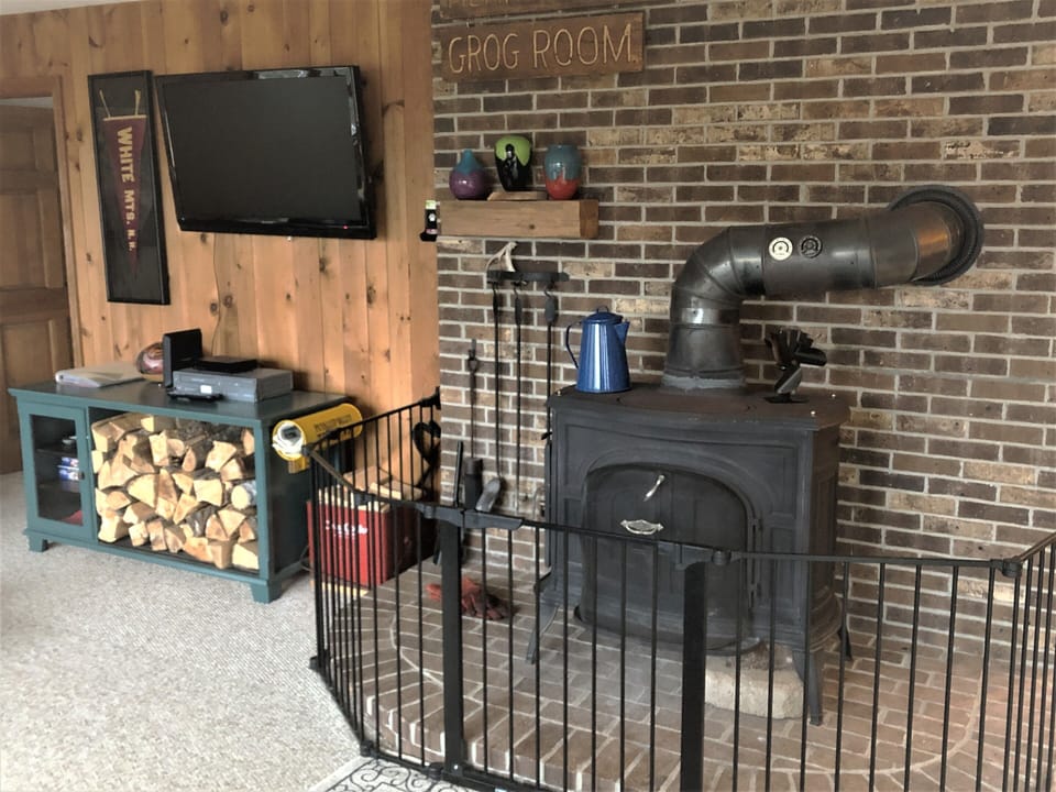 Hearth Gate added to cordon off wood stove