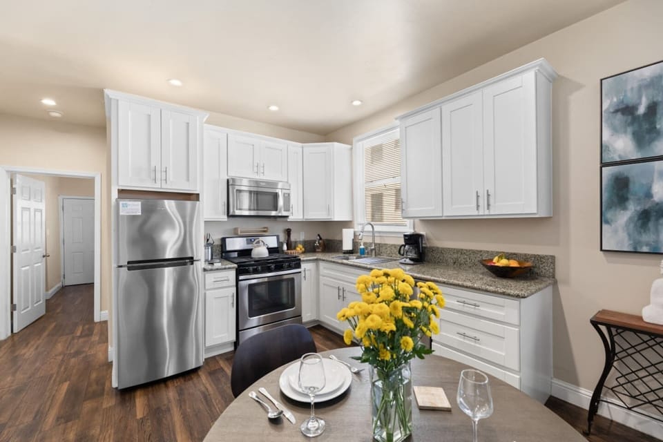 Bright, open kitchen ready for breakfast, dinner, or snacks.