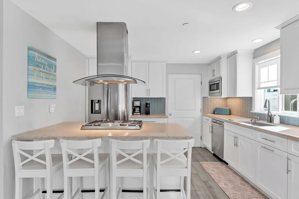 Spacious kitchen with island seating-ideal for casual dining, morning coffee, and gathering with family and friends