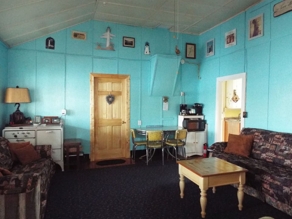 Living room with breakfast nook off the kitchen. 