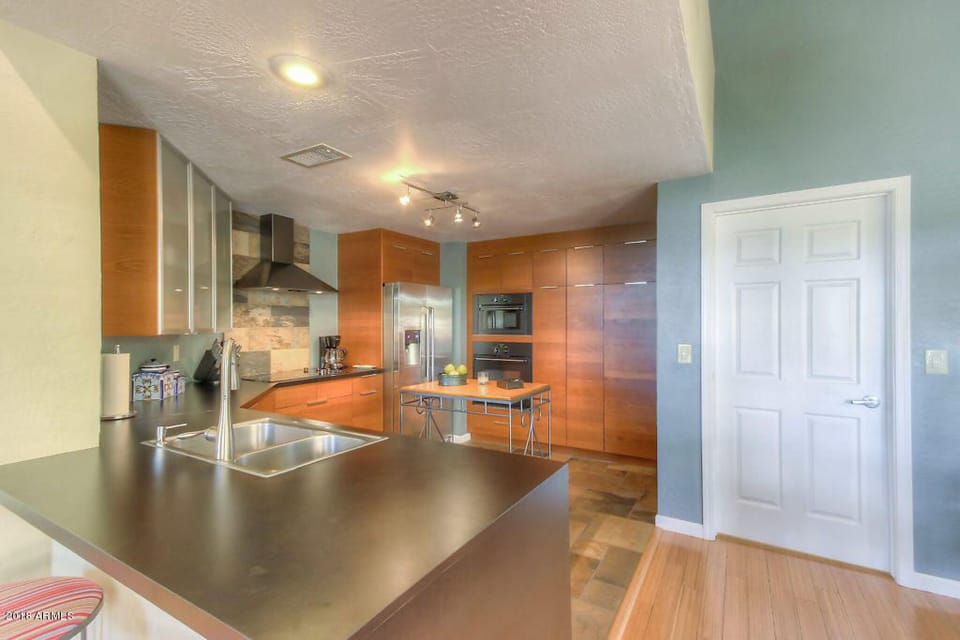 Kitchen complete with dishwasher, dishes, silverware, cookware, appliances, 