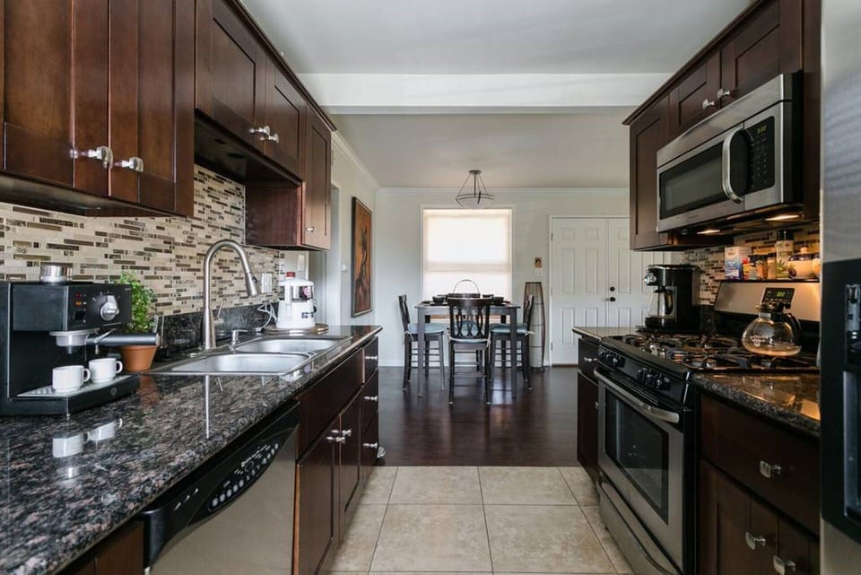 Full kitchen with well stocked pots, pans, and cooking spices. Coffee/tea maker