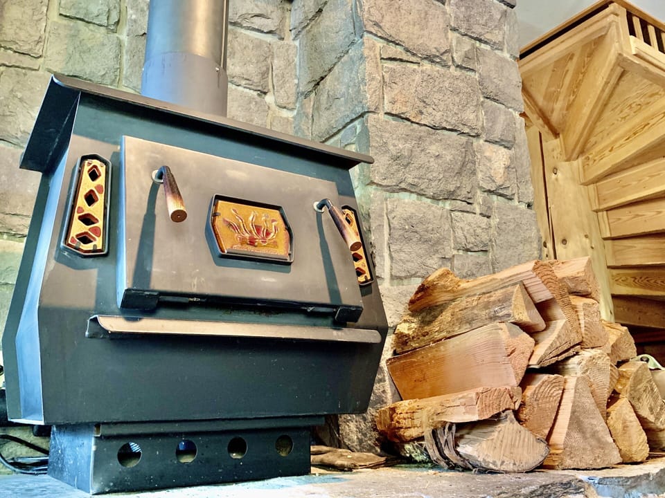 Wood Stove on standby to keep extra cozy in the winter cold - First Floor