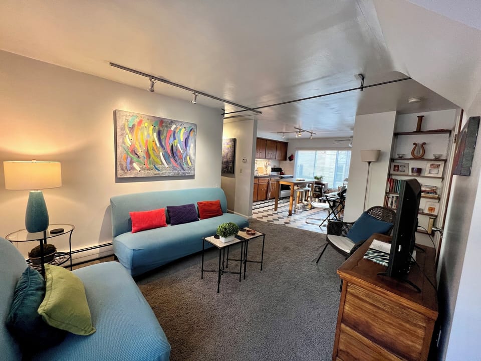 Living room looking towards kitchen and dining area