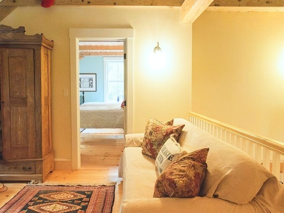 Second floor sitting area with 3 bedrooms off.