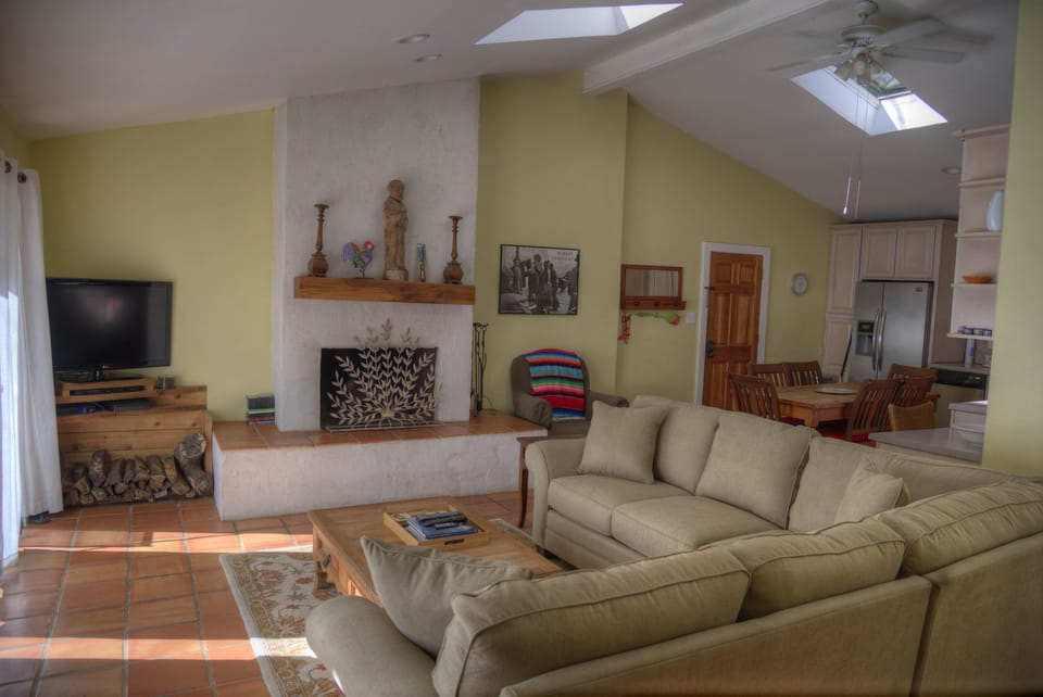 Wood fireplace and plenty of new, comfortable seating for lounge time