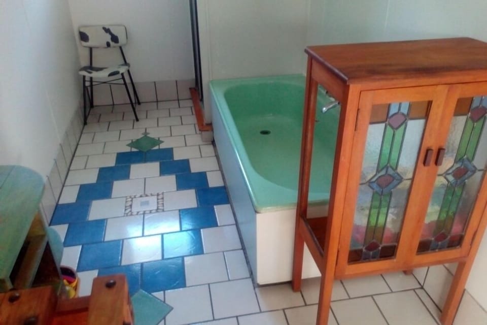 Bathroom with bath and shower