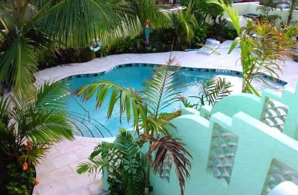 Pool and courtyard view from second floor porch. 