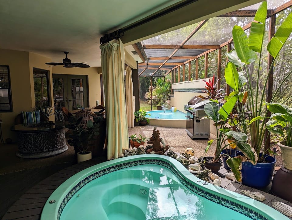  Love Outdoor Living!
Oversize Spa, BBQ, Pond, Screened Dining and Lounge Area