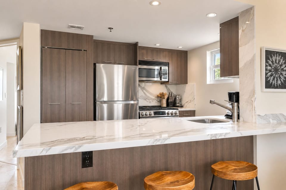Pull up a stool at the counter while someone else cooks nearby.