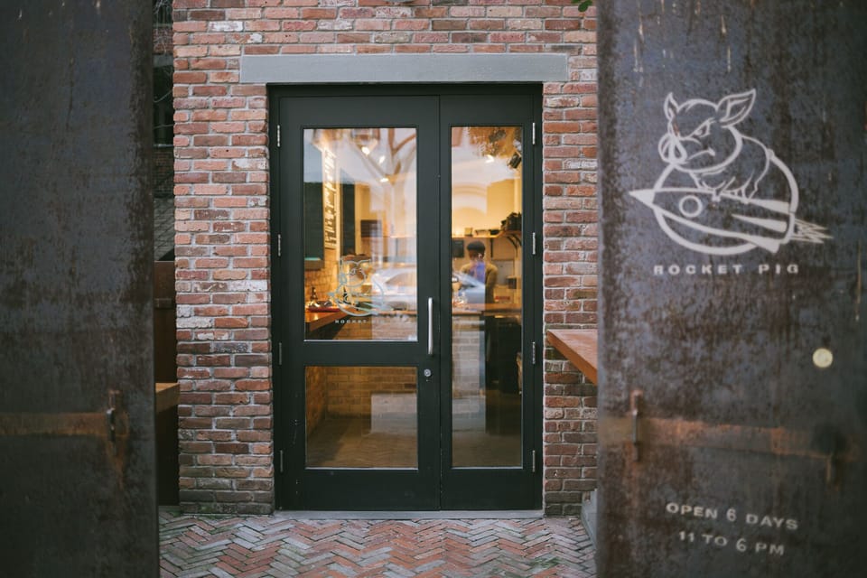 Tiny sandwich stop offering a signature smoked pork sandwich, located in Chelsea