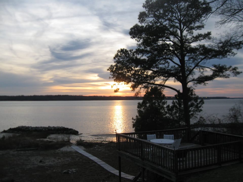 Cloudy sunset taken from the yard overlooking our deck and walkway to the beach!
