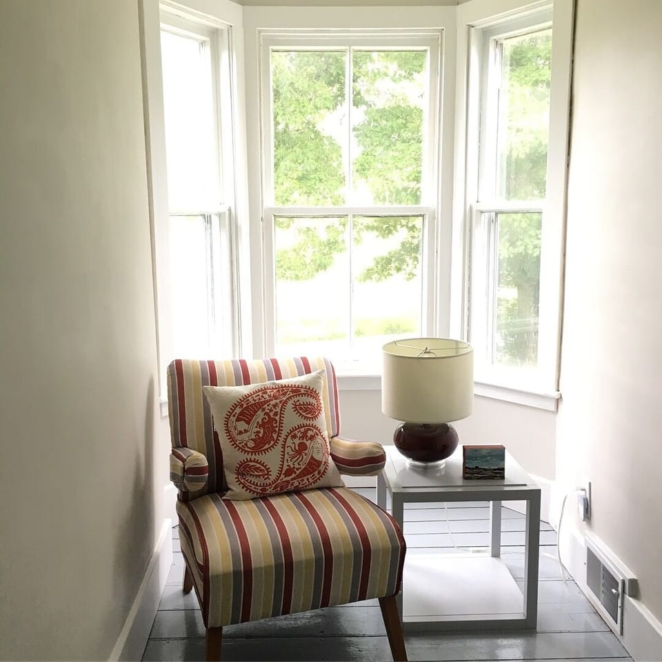A little reading spot at the top of the stairs 
