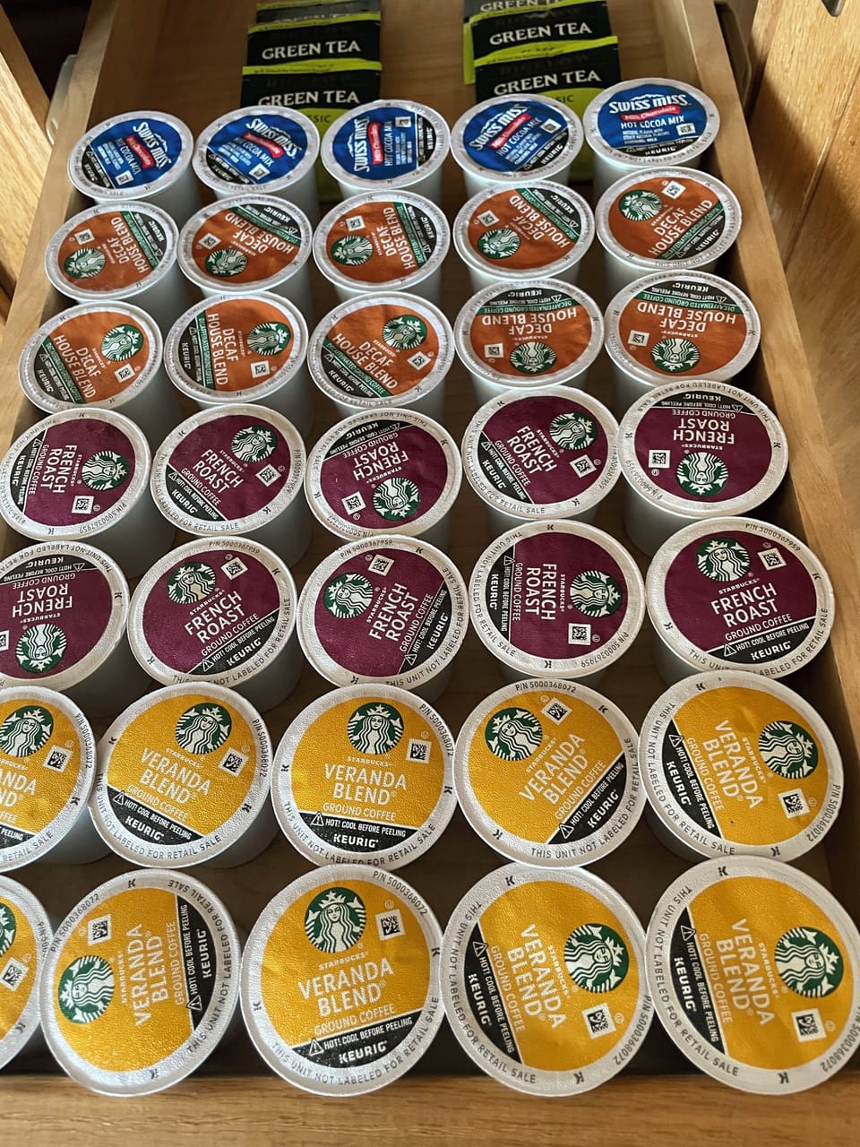 Selection of coffee & hot cocoa pods & tea provided 
