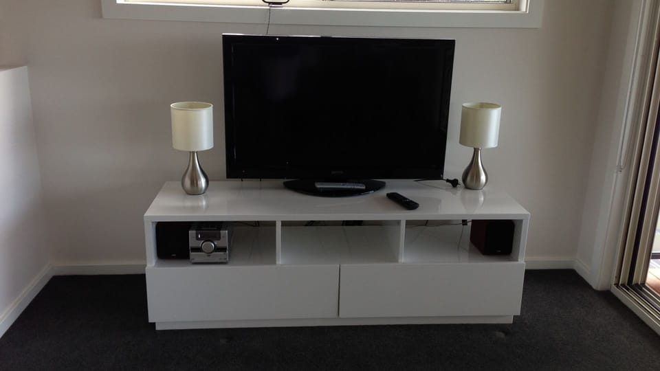 Widescreen TV with plenty of available movies