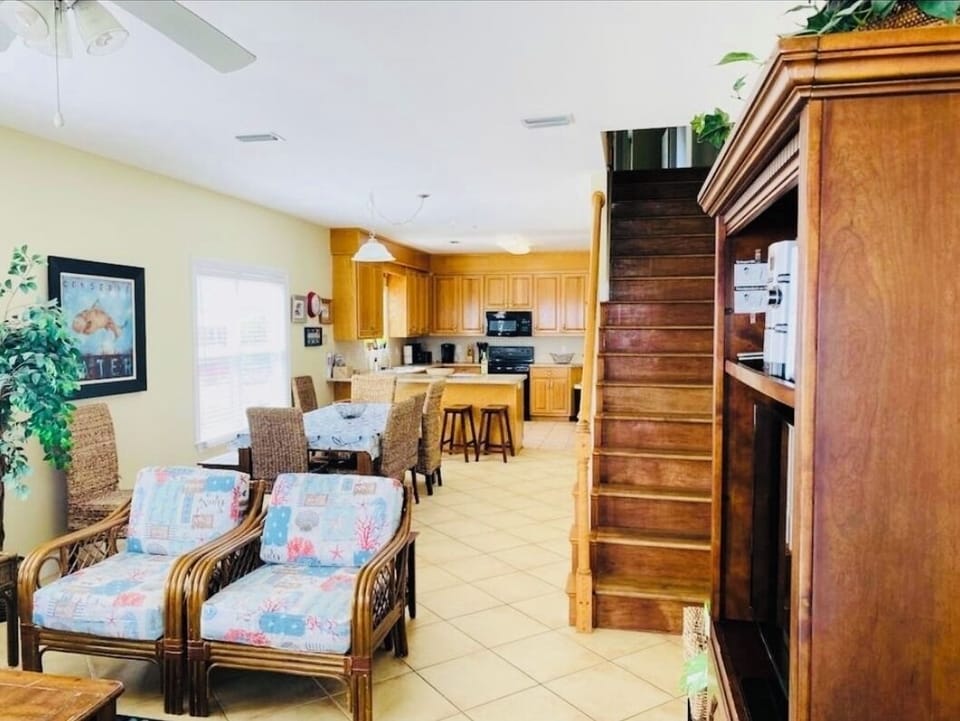 Living room facing dining room and kitchen