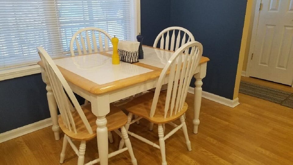 Table has a butterfly leaf to expand with 2 extra chairs to seat 6.