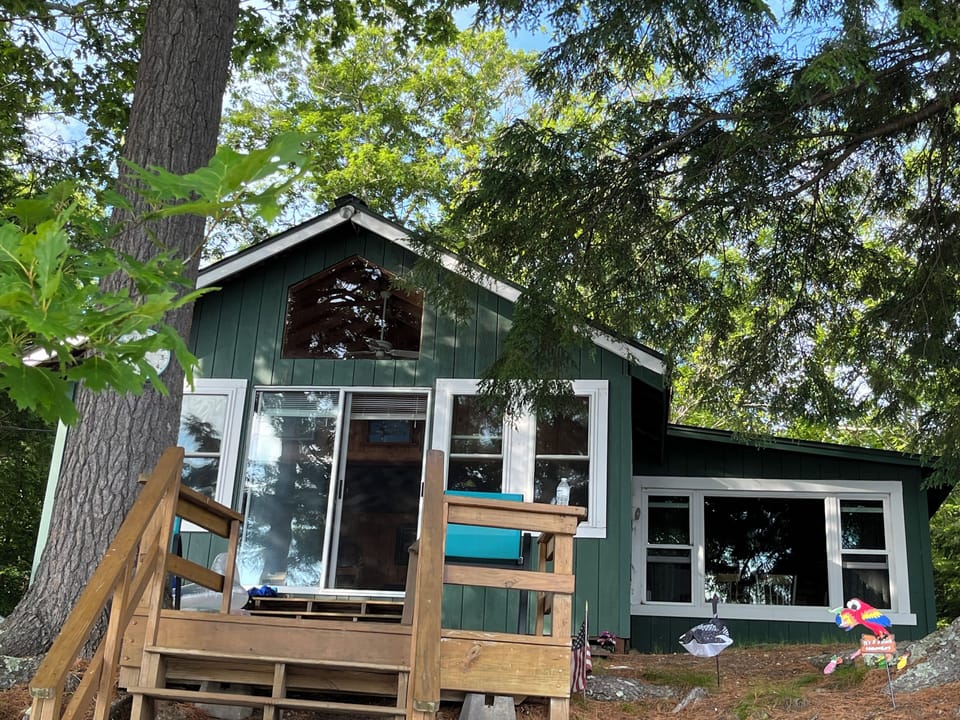 Front of cabin standing on Dock- waterfront