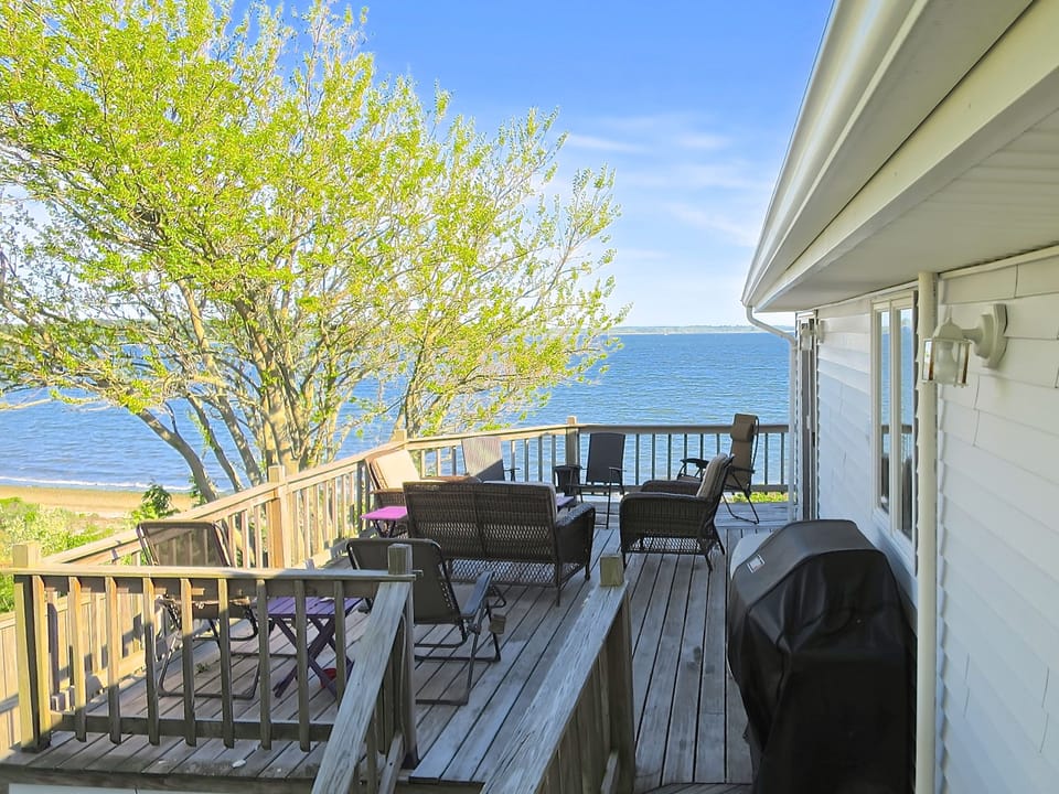 Deck extension on back side of house gives  access to deck & garden from MBR#2.