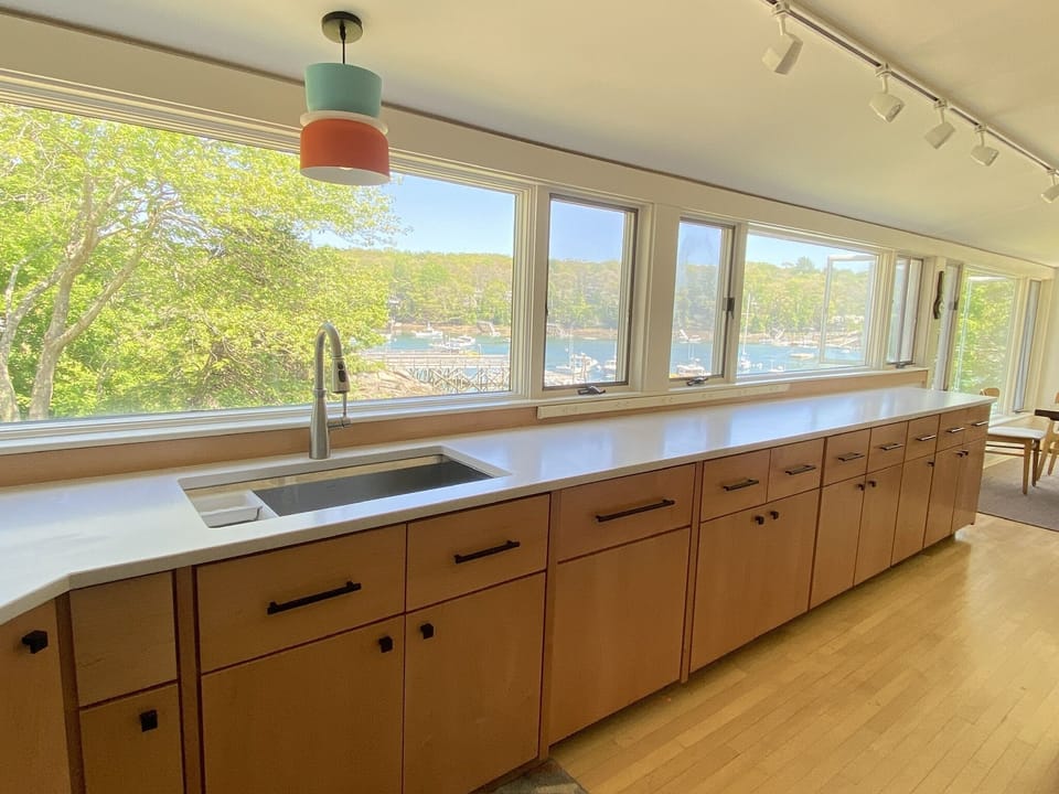 Galley kitchen with full views of the harbor.