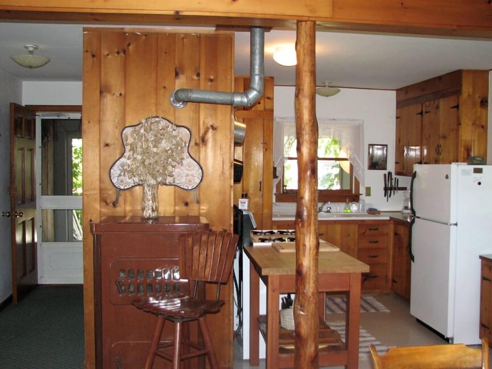 Other view of open living-space towards kitchen.