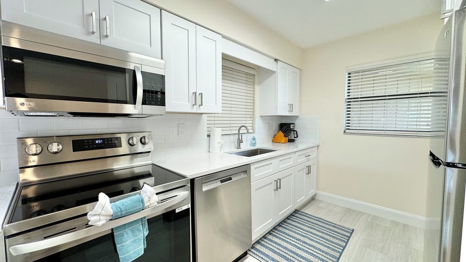 Well-Stocked Kitchen.  Brand New Cupboards and Appliances!  
