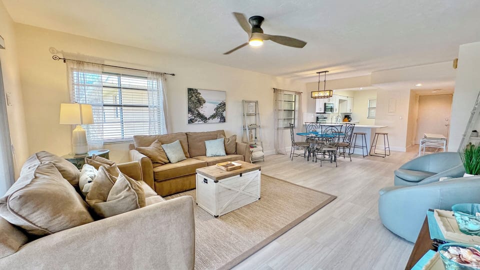 Spacious living area with a sleek 50-inch TV.