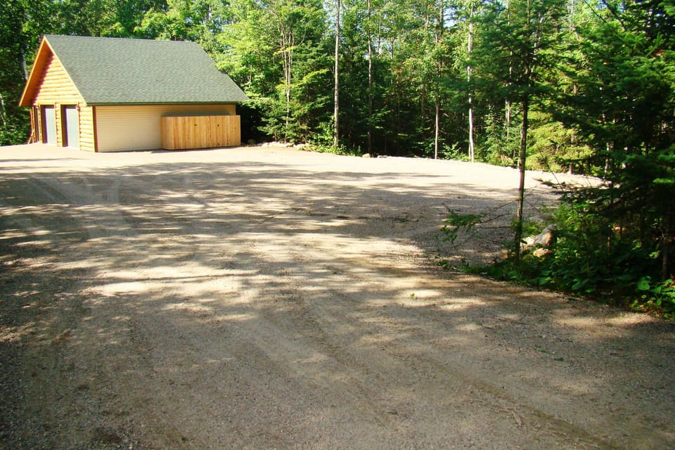 Very large parking space for vehicles, trailers, and RV's.