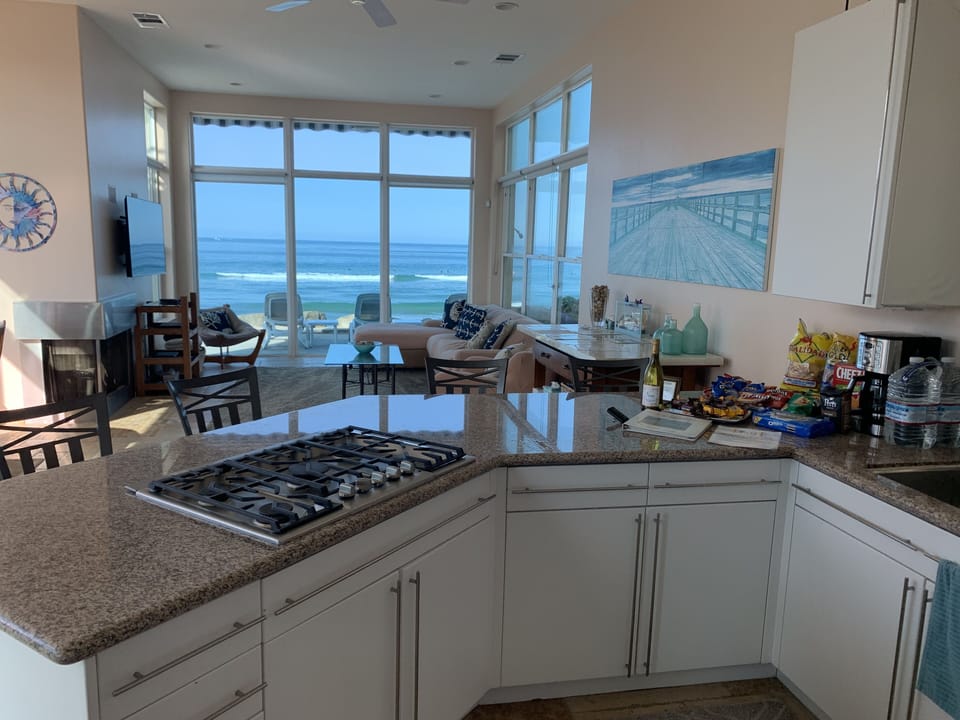 Kitchen cooking area is open, views to the ocean