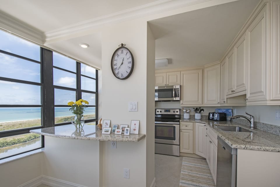 The well-stocked Kitchen is airy & pleasant to be in, w/all new appliances.