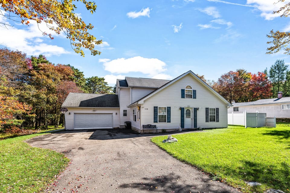 front of the house with a driveway