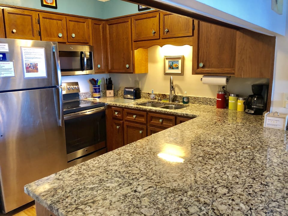 Granite counter tops and new stainless appliances make cooking a pleasure.