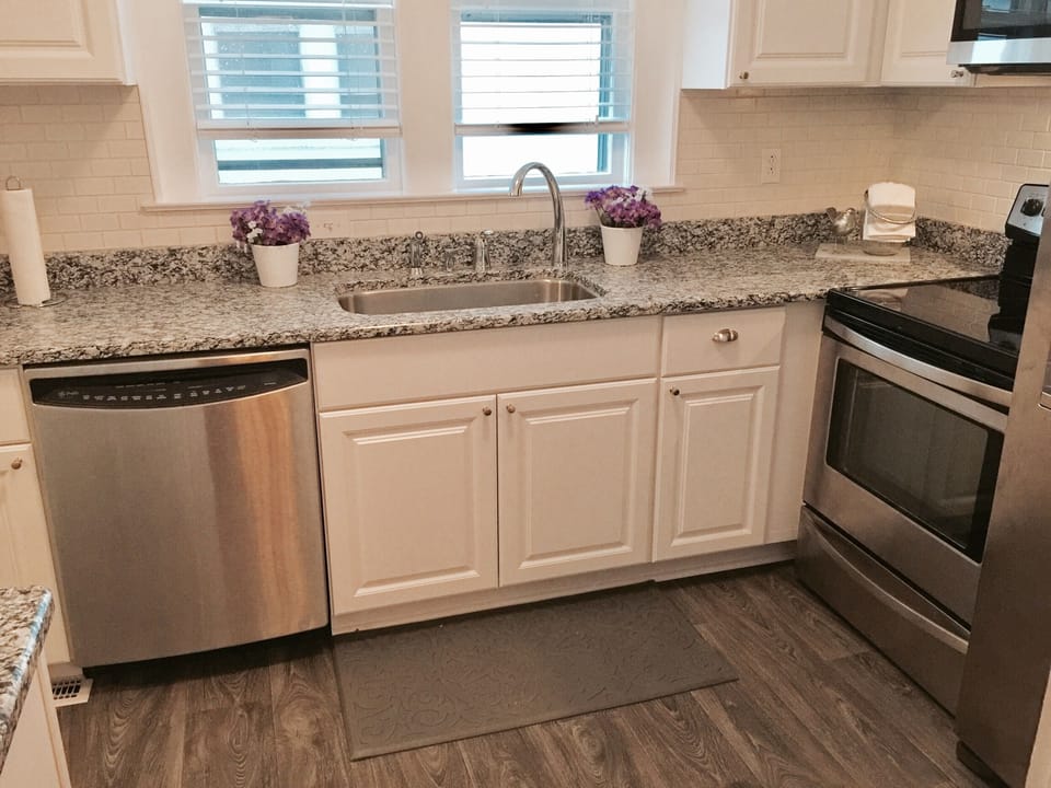 Kitchen with dishwasher, stove and refrigerator