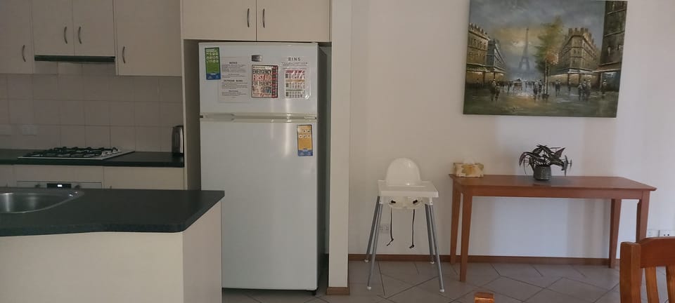 kitchen/din/liv area with High Chair