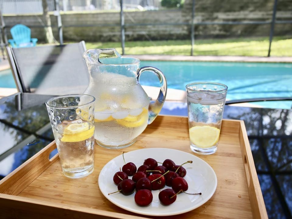 Sunny Pool Deck w/ Loungers and Dining Table