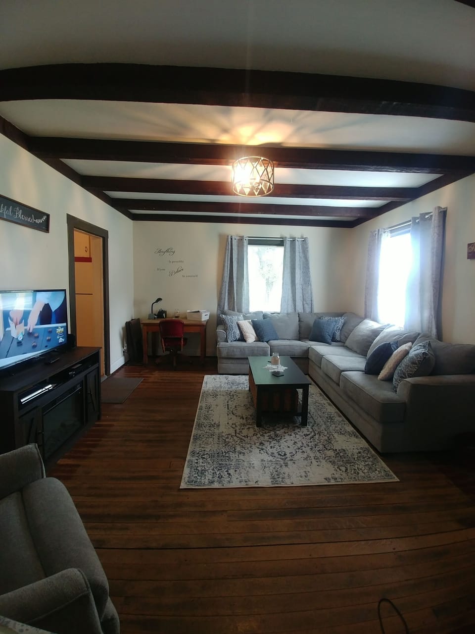 Living room with 2 recliners and new couch