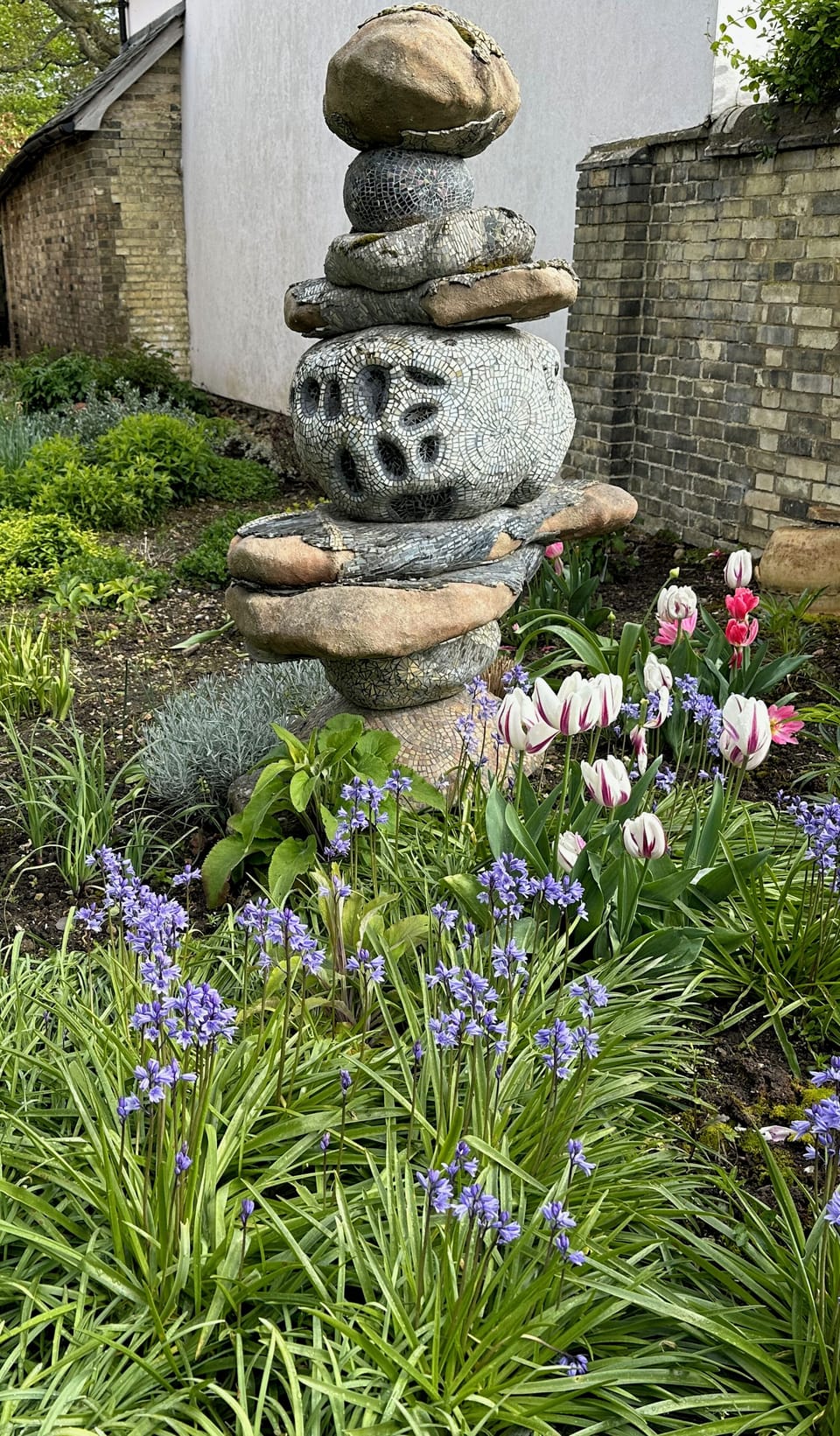 Sculpture in the flower bed