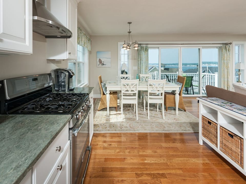 Kitchen and dinning area open to enjoy ocean views