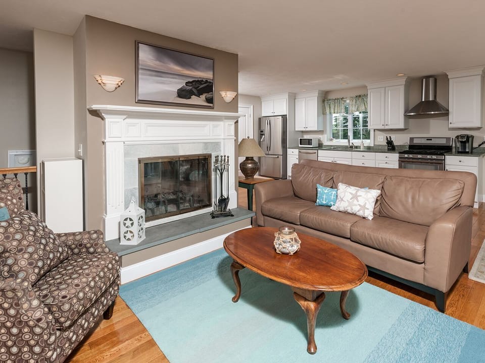Open area includes living room, kitchen and dining area