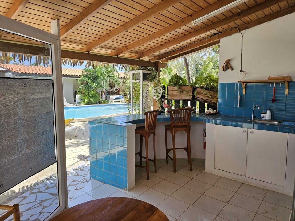 cook, dine, and unwind with a Panoramic pool view