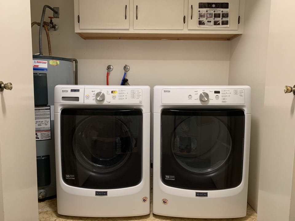 Laundry room with washer and dryer